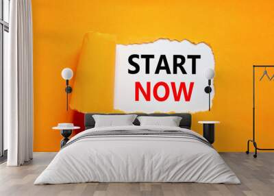 Start now symbol. Concept words Start now on beautiful white paper. Beautiful orange table orange background. Business marketing, motivational start now concept. Copy space. Wall mural