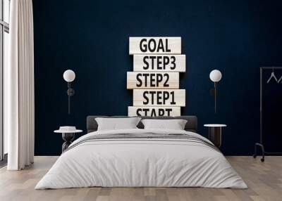 Strat, step and goal symbol. Concept words Start step 1 2 3 goal on wooden blocks on a beautiful black table black background. Copy space. Business start step 1 2 3 to goal concept. Wall mural