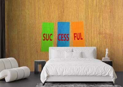 Successful symbol. Concept word Successful on beautiful colored paper. Beautiful wooden background. Business successful concept. Copy space. Wall mural