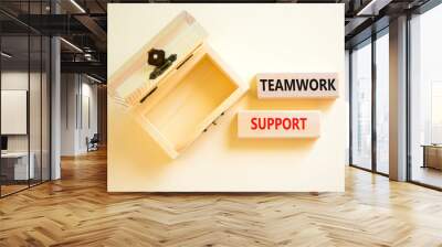 Teamwork support symbol. Concept words Teamwork support on wooden blocks on a beautiful white table white background. Empty wooden chest. Business and teamwork support concept. Copy space. Wall mural