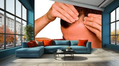 The guy spreads the hair on his head with his hands. Problem of hair loss in men. Wall mural