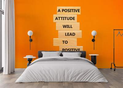 Think positive symbol. Wood blocks with words A positive attitude will come to positive outcomes. Beautiful orange background copy space. Business motivational think positive concept. Wall mural