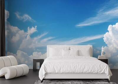  White clouds in a sunny blue sky, peaceful spring ambiance background, heavenly cloudscape  Wall mural