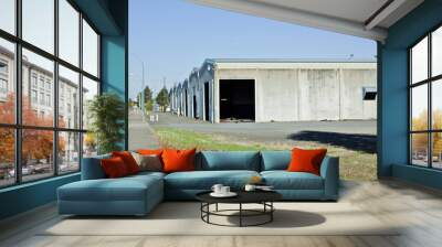 Industrial building in front of blue sky Wall mural