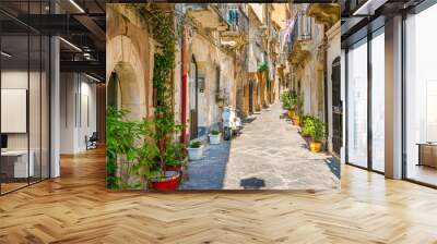 Picturesque street in Ortigia, Siracusa old town, Sicily, southern Italy. Wall mural