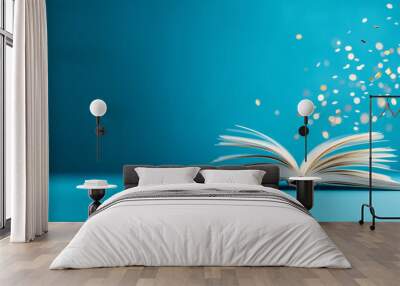 A book is open on a blue background with a lot of sparkles. The book is open to a page with a lot of text. Scene is one of excitement and wonder Wall mural