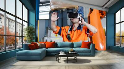 Industrial robotics engineer man using virtual reality glasses. goggles innovation future watching education internet. Work is controlled through modern digital system. Wall mural