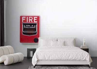 Red fire alarm box on white wall Inside building, Alarm device. Wall mural