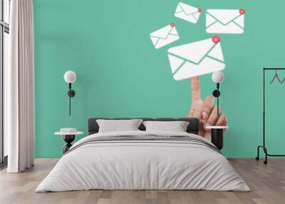 Sending email contact network concept. Hands finger touch pointing email contact icons green background, communication message send and receive. Wall mural