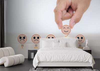 Smile face on wooden toy for customer services rating feedback satisfaction survey business review questionnaire development for service mind, social media digital global marketing management Wall mural