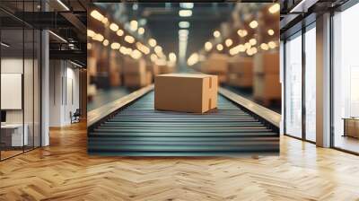 A cardboard box on a conveyor belt in a modern warehouse, showcasing logistics and distribution processes. Wall mural