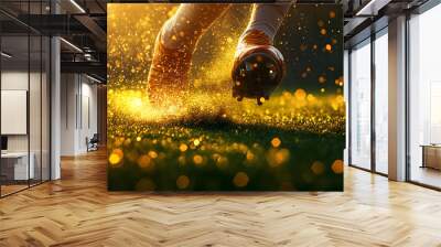 A close-up of a soccer player sprinting, kicking up golden dust on the field at sunset, showcasing dynamic movement and energy. Wall mural