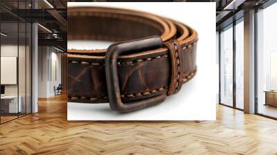 A close-up of a stylish brown leather belt showcasing intricate stitching and a classic metal buckle. Wall mural