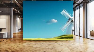 A picturesque windmill standing on a lush green hill under a clear blue sky. Wall mural