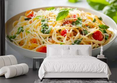 Delicious spaghetti with fresh basil, cherry tomatoes, and grated cheese, perfect for a gourmet meal or culinary inspiration. Wall mural