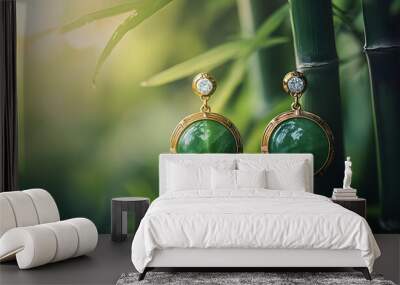 Elegant green jade earrings with a golden setting, surrounded by lush bamboo, capturing a serene natural ambiance. Wall mural