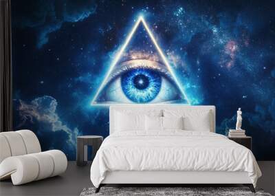 Eye of Providence in the starry night sky. Shining all-seeing God's eye in triangle. Illuminati and Freemasons symbol Wall mural