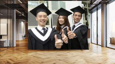 graduation group two man and girl smiling on campus Wall mural