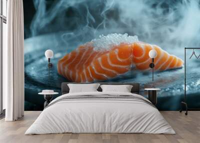 A piece of salmon is on a plate with a white sauce and a lot of steam coming off it Wall mural