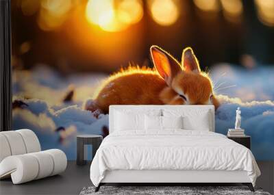 A small rabbit is sleeping in the snow. The image has a peaceful and serene mood, as the rabbit is resting in a quiet and calm environment Wall mural