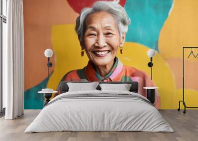 Group portrait photography of a happy Indonesian woman in her 90s wearing a chic cardigan against an abstract background  Wall mural