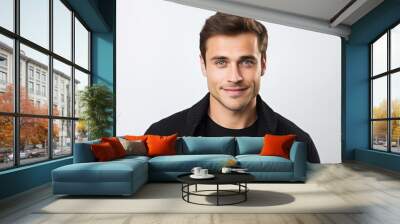 Portrait of handsome young man in black sweater, isolated on white background Wall mural