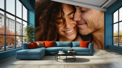 Close-up of romantic young boyfriend kissing smiling beautiful girlfriend Wall mural