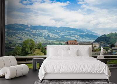 Scenic route and roadside hotels in Alps , Interlaken Switzerland Wall mural