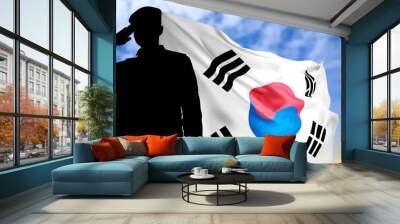 Silhouette of soldier saluting with South Korea flag on background of sunrise or sunset. Armed forces of Korea concept. Wall mural