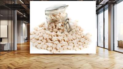 Piles of pale whole grain children's puffed cereal snack Wall mural