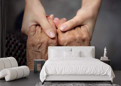 hands of old and young woman  Wall mural