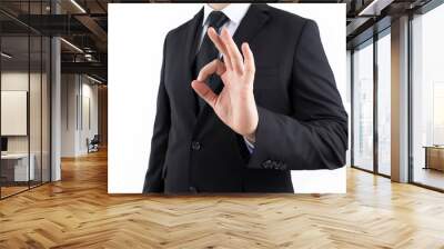 young businessman showing an okay sign isolated on white background. Wall mural