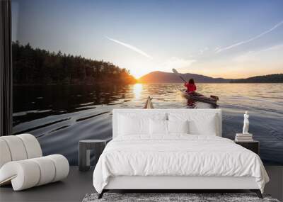 Adventurous Woman on Sea Kayak paddling in the Pacific Ocean. Sunny Summer Sunset. Taken near Victoria, Vancouver Islands, British Columbia, Canada. Concept: Sport, Adventure Wall mural