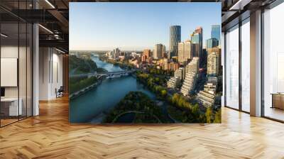 Aerial panoramic view of a beautiful modern cityscape during a vibrant sunny sunrise. Taken in Calgary Downtown, Alberta, Canada. Wall mural