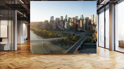 Aerial panoramic view of a beautiful modern cityscape during a vibrant sunny sunrise. Taken in Calgary Downtown, Alberta, Canada. Wall mural