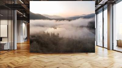 Aerial Panoramic View of Fairy Lake covered in clouds during a vibrant summer sunrise. Taken near Port Renfrew, Vancouver Island, British Columbia, Canada. Wall mural