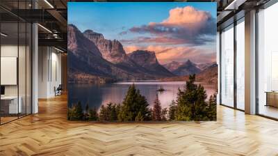 Beautiful Panoramic View of a Glacier Lake with American Rocky Mountain Landscape in the background. Dramatic Colorful Sunrise Sky. Taken in Glacier National Park, Montana, United States. Wall mural