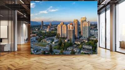 City Buildings and homes in residential suburbs. Sunny Cloudy Sunset Sky. Wall mural