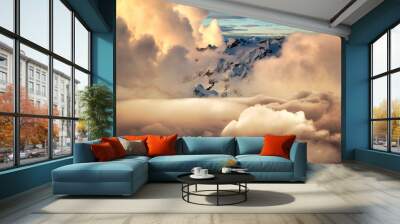 Cloudscape and Mountains Background. Beautiful and striking aerial view of the puffy clouds during a colorful and vibrant sunset or sunrise. Landscape taken in British Columbia, Canada. composite Wall mural