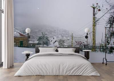 Beautiful landscape of mountainous town in winter, many cozy cottage, eco tourism,Deir El Kamar mountains in Lebanon, wintertime holidays concept Wall mural