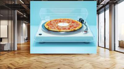 A pepperoni pizza playing on a record player with the needle resting on the crust. Wall mural