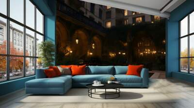 A serene courtyard with a pool, lit by lanterns, nestled within a historic building at night. Wall mural