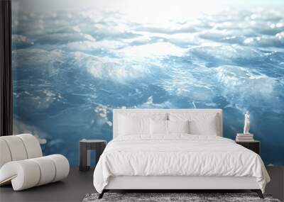 Abstract blue water with sunlight reflections. Wall mural