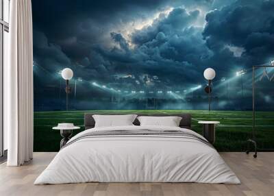 Empty football field at night with dramatic stormy sky and bright spotlights. Wall mural