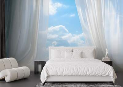 White sheer curtains gently billowing open to reveal a bright blue sky with fluffy clouds. Wall mural