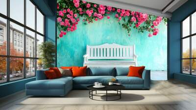 White wooden bench in front of teal wall with pink roses. Wall mural