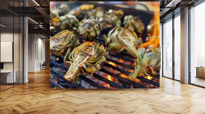 Artichoke halves are grilled on an open barbecue fire Wall mural