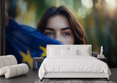 Young woman holds European flag Wall mural