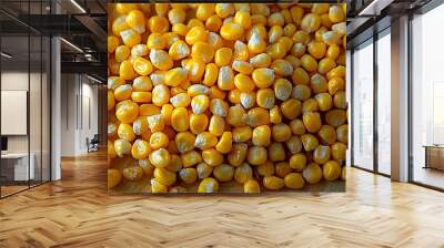 Close-up of fresh yellow corn kernels, vibrant food background Wall mural