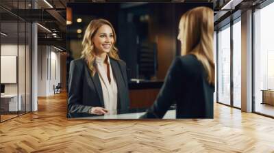 A dedicated executive and hotel manager, a woman of corporate excellence, is seen at the reception desk, providing top-notch service to guests. Wall mural